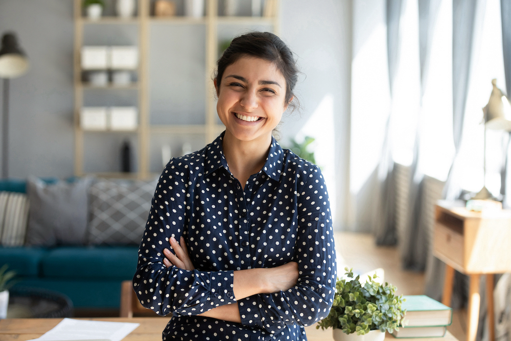 Smiling,Young,Adult,Indian,Woman,Looking,At,Camera,Posing